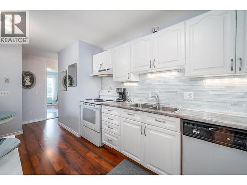 878 Bernard Avenue Unit# 103, Kelowna, BC - Indoor Photo Showing Kitchen With Double Sink