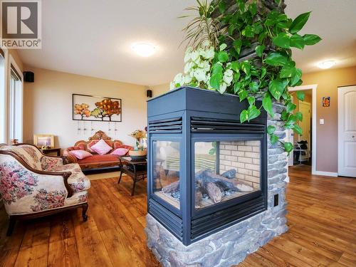 798 Ruttan Road, Quesnel, BC - Indoor Photo Showing Living Room With Fireplace