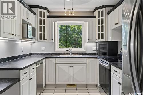 109 1St Avenue E, Vanscoy, SK - Indoor Photo Showing Kitchen With Double Sink