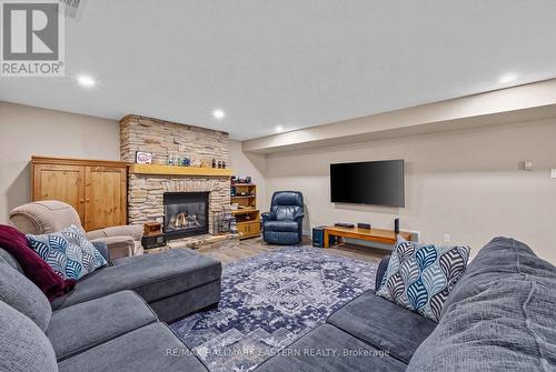 Gas fire place - 2552 Denure Drive, Peterborough (Monaghan Ward 2), ON - Indoor Photo Showing Other Room With Fireplace