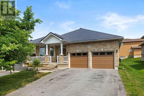 2 cars comfortably fit in garage - 2552 Denure Drive, Peterborough (Monaghan Ward 2), ON - Outdoor With Facade