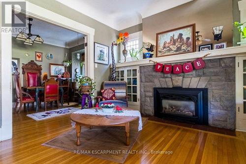 121 Eastbourne Avenue, Hamilton, ON - Indoor Photo Showing Living Room With Fireplace