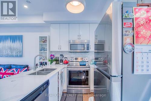 63 - 27 Eldora Avenue, Toronto, ON - Indoor Photo Showing Kitchen With Double Sink