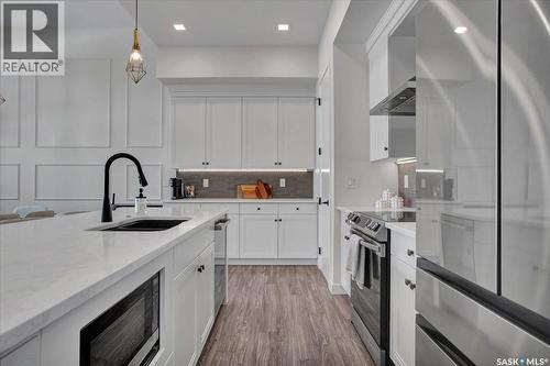 411 Dagnone Terrace, Saskatoon, SK - Indoor Photo Showing Kitchen With Upgraded Kitchen