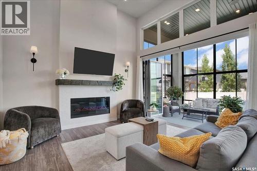 411 Dagnone Terrace, Saskatoon, SK - Indoor Photo Showing Living Room With Fireplace