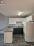 1125 Mctavish Street, Regina, SK  - Indoor Photo Showing Kitchen With Double Sink 