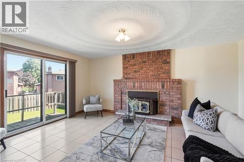 18 Marcel Place, Hamilton, ON - Indoor Photo Showing Living Room With Fireplace