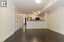Open-concept living area with dark wood-finish flooring - 190 Century Hill Drive Unit# A5, Kitchener, ON  - Indoor 