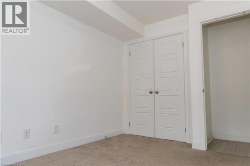 Room featuring white walls and neutral carpet flooring - 190 Century Hill Drive Unit# A5, Kitchener, ON - Indoor Photo Showing Other Room