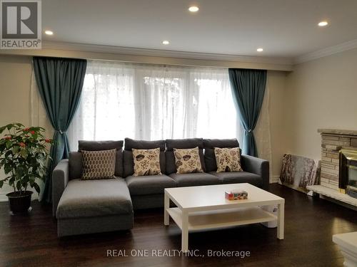 Living Room 1 - 26 Applefield Drive, Toronto, ON - Indoor Photo Showing Living Room With Fireplace