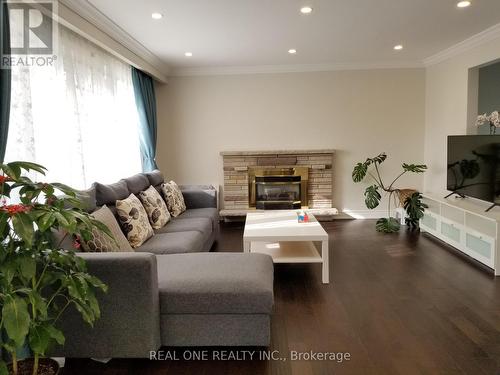Living Room 2 - 26 Applefield Drive, Toronto, ON - Indoor Photo Showing Living Room With Fireplace