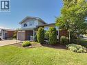 Brick and siding exterior with mature landscaping - 143 Cromwell Crescent, Hamilton, ON  - Outdoor 