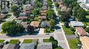 Established residential area featuring mature trees and a grid street pattern - 143 Cromwell Crescent, Hamilton, ON  - Outdoor With View 