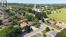 Aerial perspective of a residential neighborhood featuring detached homes with private yards and mature trees - 143 Cromwell Crescent, Hamilton, ON  - Outdoor With View 