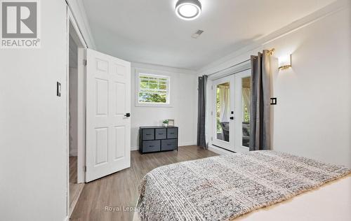 Walk out to enclosed porch - 7462 15 Side Road, Halton Hills, ON - Indoor Photo Showing Bedroom