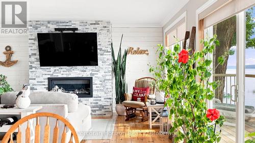 380 Robins Point Road, Tay (Victoria Harbour), ON - Indoor With Fireplace