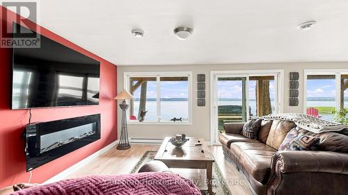 380 Robins Point Road, Tay (Victoria Harbour), ON - Indoor Photo Showing Living Room With Fireplace