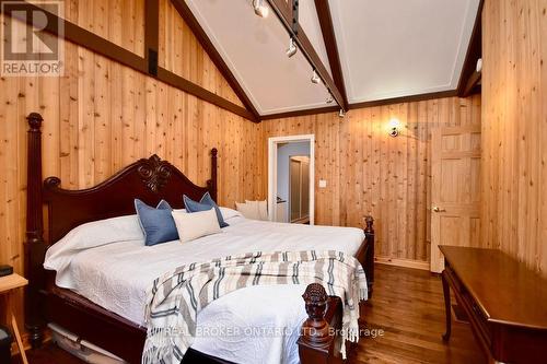 Primary w/walk out to water facing deck & ensuite - 5818 Victoria Park Road, Ramara, ON - Indoor Photo Showing Bedroom