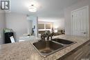5602 Dewdney Avenue, Regina, SK  - Indoor Photo Showing Kitchen With Double Sink 