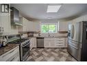 2908 Marion Avenue, Terrace, BC  - Indoor Photo Showing Kitchen With Double Sink 