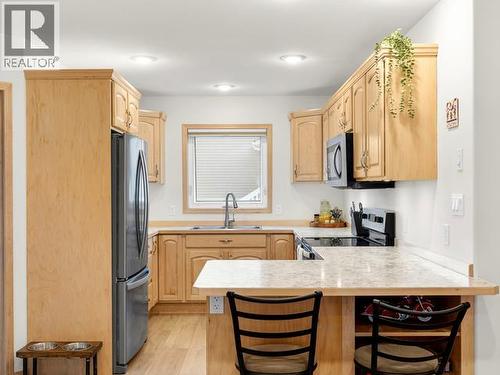 105-250 Olive May Way, Whitehorse, YT - Indoor Photo Showing Kitchen