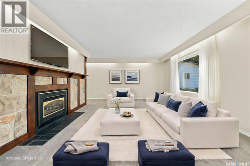 725 7Th Street E, Saskatoon, SK - Indoor Photo Showing Living Room With Fireplace