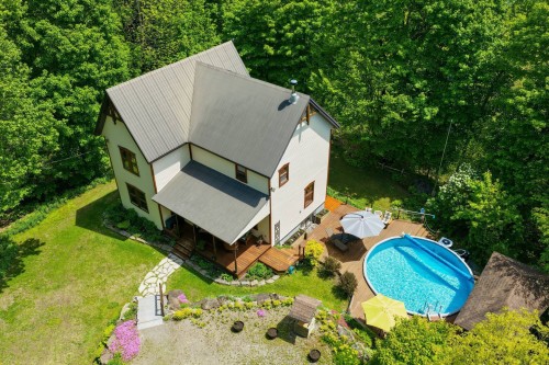 Front of Structure - 57 Mtée De L'Église, Mille-Isles, QC - Outdoor With Above Ground Pool