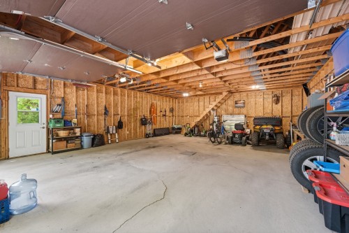 Garage - 57 Mtée De L'Église, Mille-Isles, QC - Indoor Photo Showing Garage