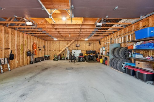 Garage - 57 Mtée De L'Église, Mille-Isles, QC - Indoor Photo Showing Garage