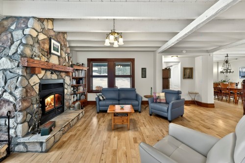 Living Room - 57 Mtée De L'Église, Mille-Isles, QC - Indoor Photo Showing Living Room With Fireplace