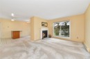 #208-949 Cloverdale Ave, Saanich, BC  - Indoor Photo Showing Living Room With Fireplace 