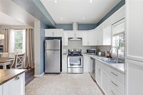 313 Leila Ave, Winnipeg, MB - Indoor Photo Showing Kitchen With Double Sink