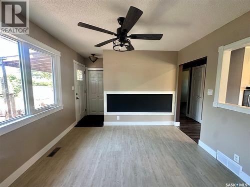 104 Johnston Crescent, Canora, SK - Indoor Photo Showing Other Room With Fireplace