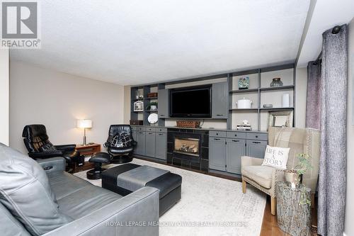 38 Mckillop Court, Brampton, ON - Indoor Photo Showing Living Room With Fireplace
