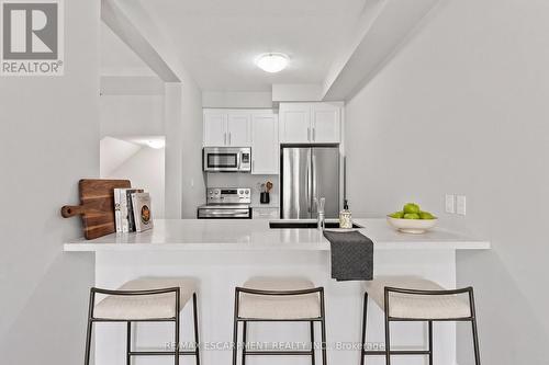 Virtually Staged - 13 Aqua Lane, Hamilton, ON - Indoor Photo Showing Kitchen With Stainless Steel Kitchen