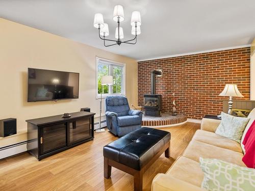 6 Millbrook Drive, Stratford, PE - Indoor Photo Showing Living Room With Fireplace