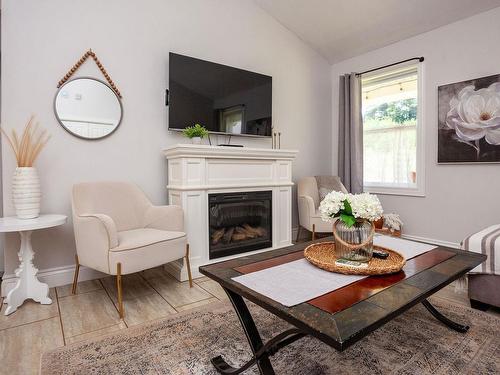 22 170 Schoolhouse Lane, Stanley Bridge, PE - Indoor Photo Showing Living Room With Fireplace