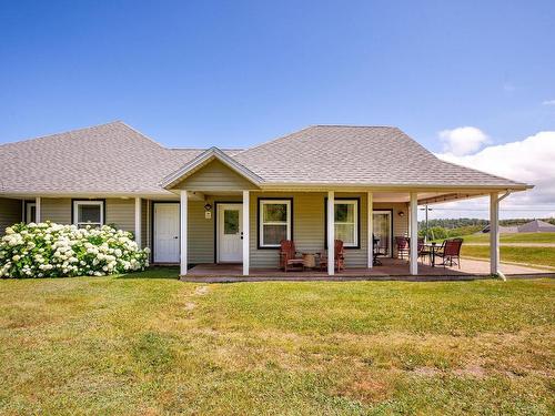 22 170 Schoolhouse Lane, Stanley Bridge, PE - Outdoor With Deck Patio Veranda With Facade