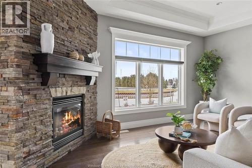 33 Montego Bay Crescent, Kingsville, ON - Indoor Photo Showing Living Room With Fireplace