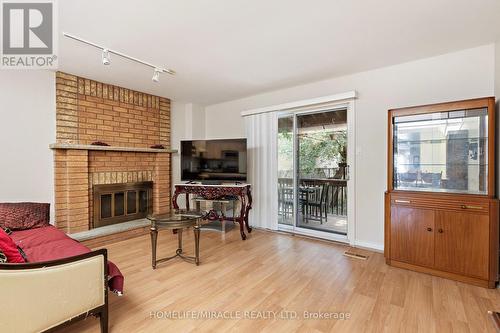 33 Torrens Avenue, Toronto, ON - Indoor Photo Showing Living Room With Fireplace