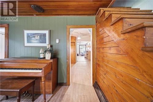 19 Government Road, Tehkummah, ON - Indoor Photo Showing Other Room With Fireplace