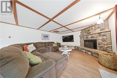 19 Government Road, Tehkummah, ON - Indoor Photo Showing Living Room With Fireplace