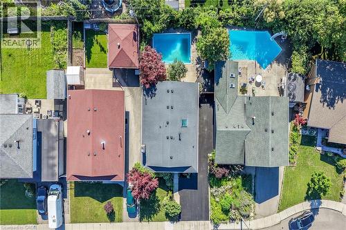Image quality insufficient for description - 101 Loyalist Drive, Hamilton, ON - Outdoor With In Ground Pool