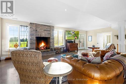 385073 4Th Conc A Road, Grey Highlands, ON - Indoor Photo Showing Living Room With Fireplace
