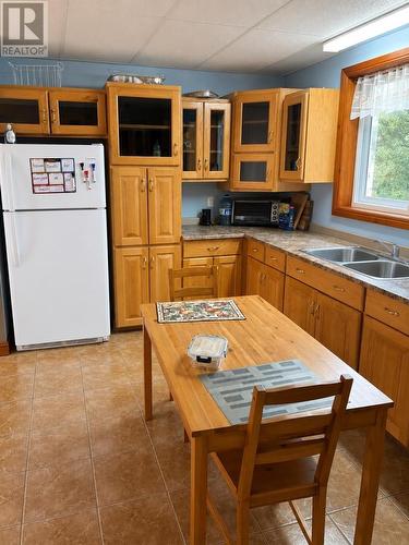 32 Lansdowne St S, Chapleau, ON - Indoor Photo Showing Kitchen With Double Sink