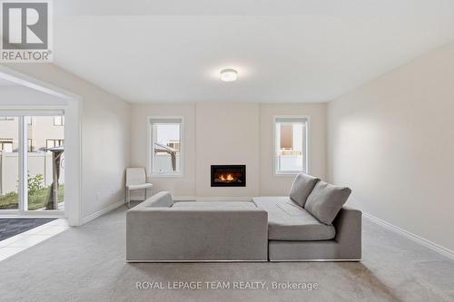 Living Room w Gas Fireplace - 153 Unity Place, Ottawa, ON - Indoor Photo Showing Living Room With Fireplace