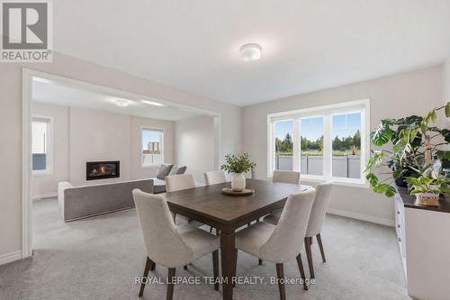 Dining Room Virtually Staged - 153 Unity Place, Ottawa, ON - Indoor Photo Showing Dining Room With Fireplace