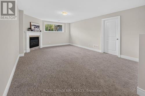 456 Daytona Drive, Fort Erie (Crescent Park), ON - Indoor Photo Showing Other Room With Fireplace
