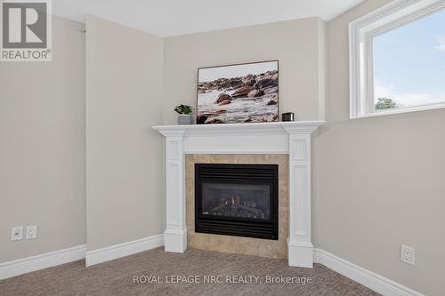 456 Daytona Drive, Fort Erie (Crescent Park), ON - Indoor Photo Showing Living Room With Fireplace