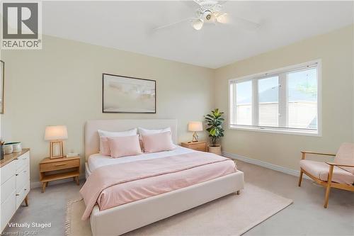Bedroom featuring light-toned walls, white trim, and neutral carpeting - 2248 Seton Crescent, Burlington, ON - Indoor Photo Showing Bedroom